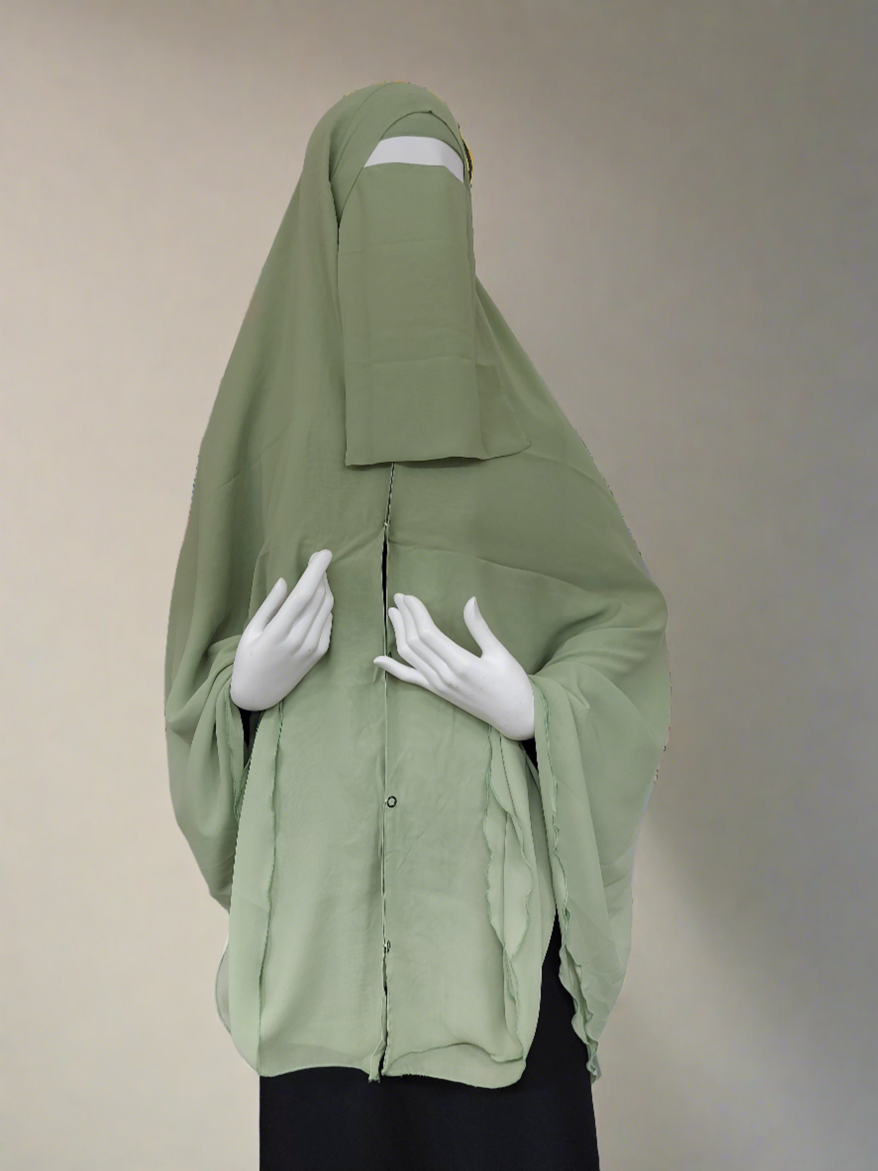 Premium chiffon double-layered buttoned jilbab with back tie & matching niqab in light green color by Niqabik