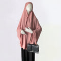 Premium chiffon double-layered buttoned jilbab with back tie in dusty pink color by Niqabik